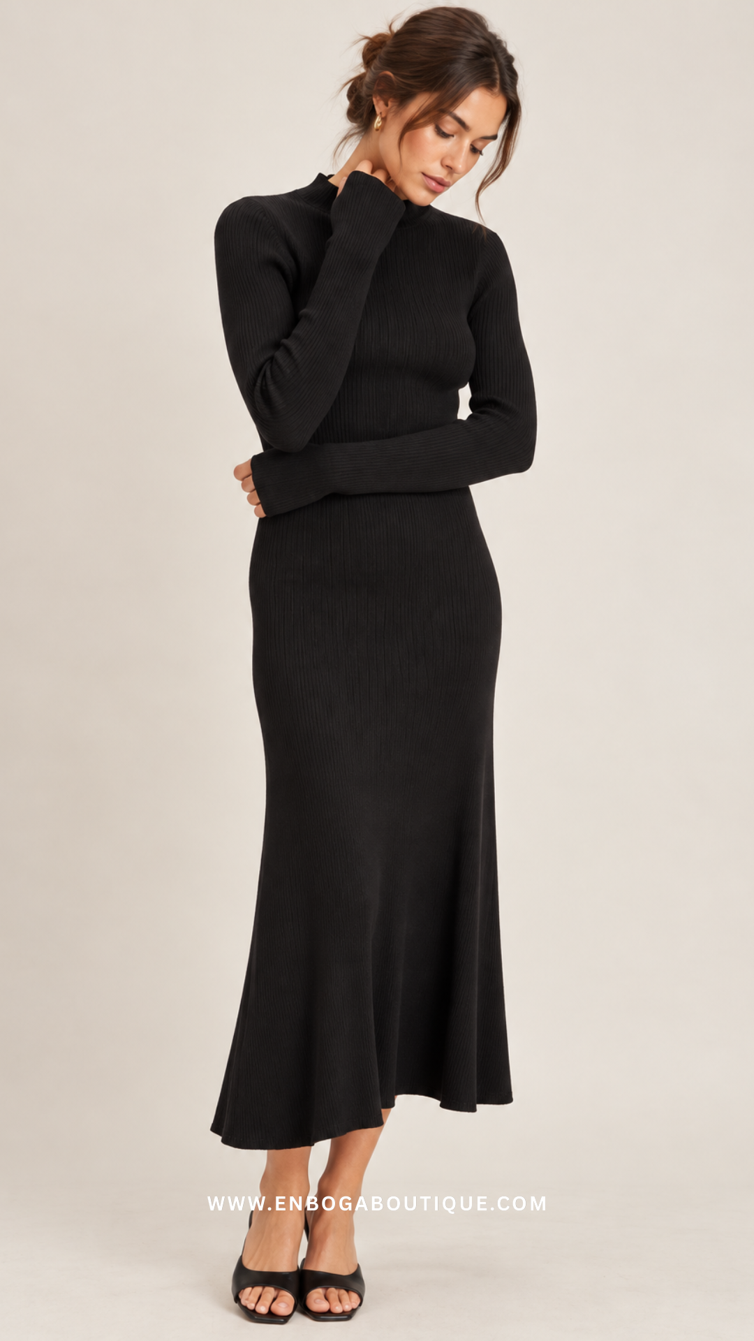 VESTIDO MIDI NEGRO DE PUNTO