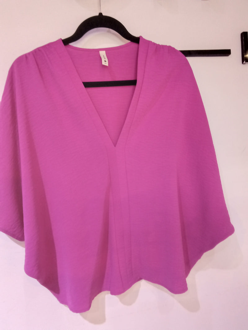 Blusa morado con cuello V